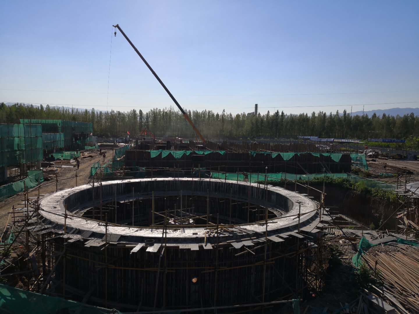 1531791040270669.jpg 13新疆污水處理廠項(xiàng)目調(diào)壓池施工.jpg